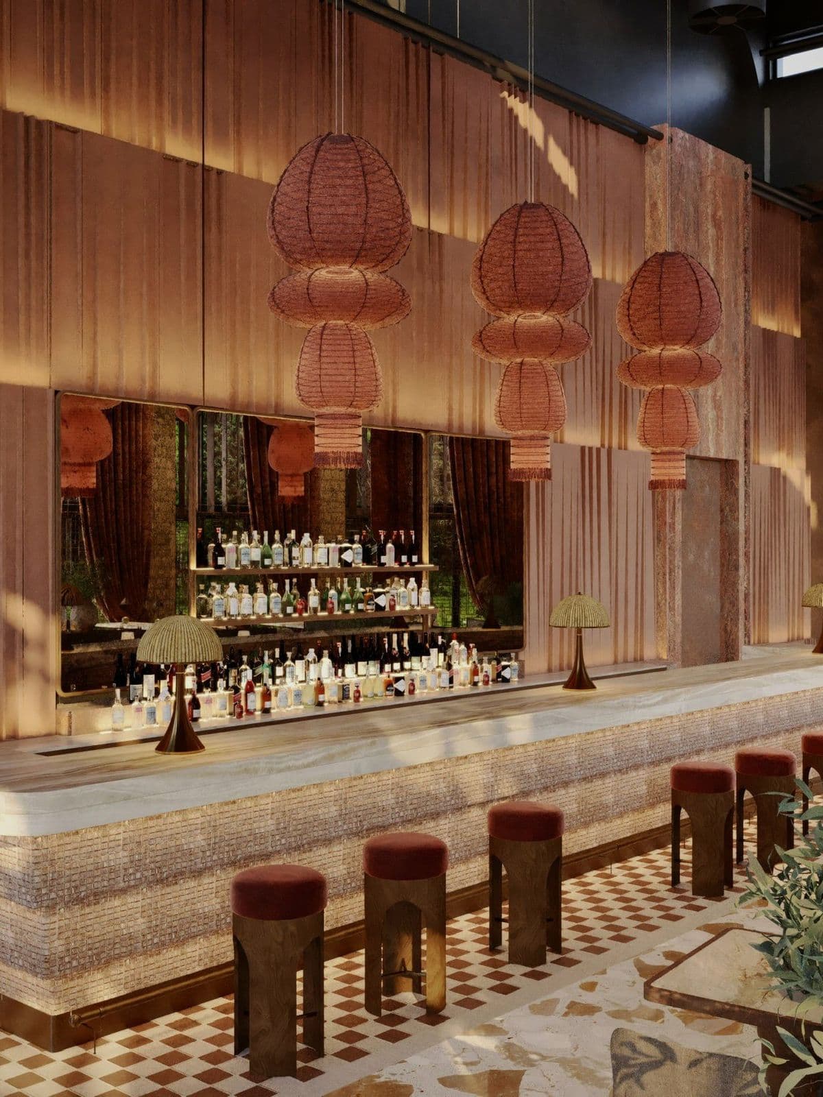 The bar: an onyx counter lined with velvet stools under rattan lantern pendants, with bottles shelved against a mirrored wall